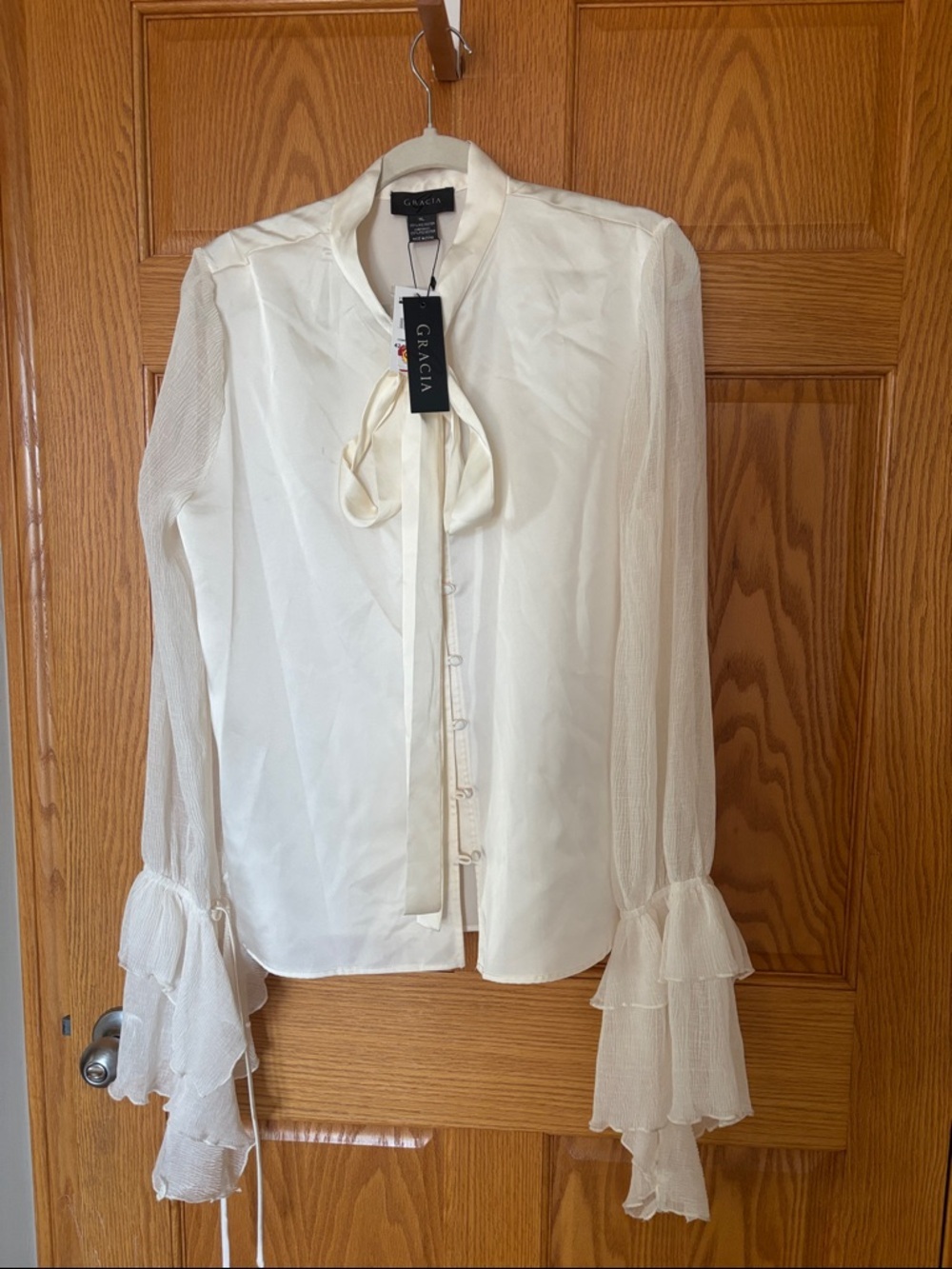 Gracia Ivory Tie-Neck Sheer Ruffle Sleeve Blouse